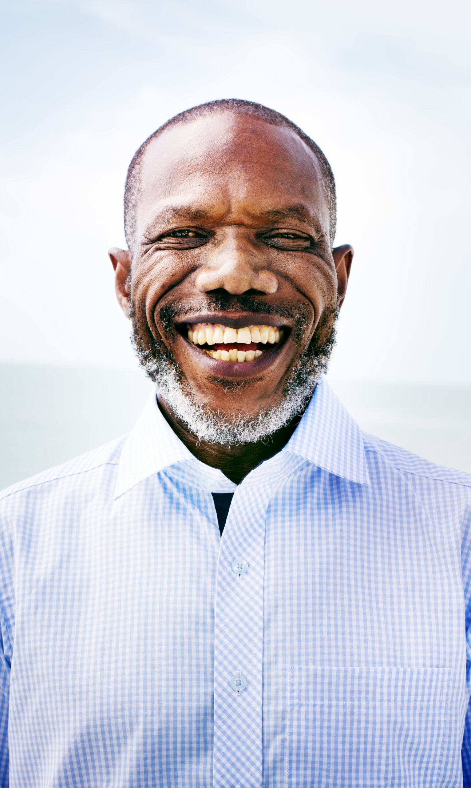african man beach vacation lifestyle portrait concept scaled e1771246200941